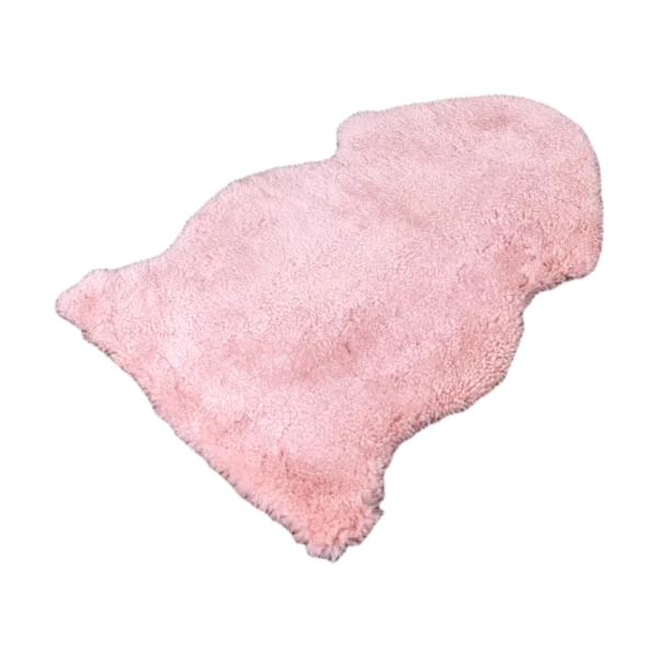 Luxurious Pink Small Sheepskin Rug from Simply Sheepskin add comfort and style to any room.