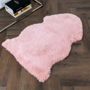 Luxurious Pink Small Sheepskin Rug from Simply Sheepskin add comfort and style to any room.