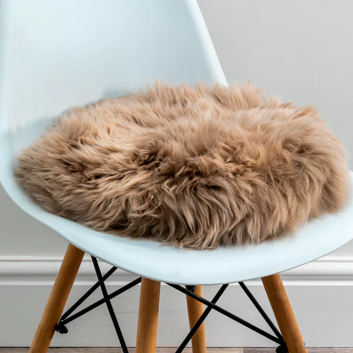 Luxurious Sheepskin Seat Pade from Simply Sheepskin add comfort and style to any room.