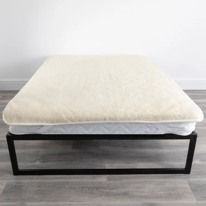 Luxurious Wool Mattress Cover from Simply Sheepskin add comfort and style to any room.