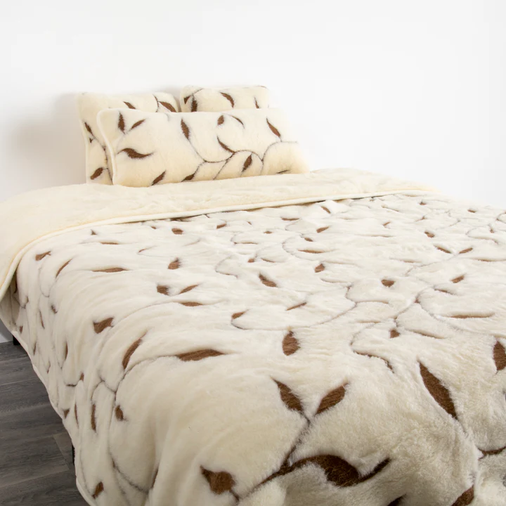 Luxurious Wool Quilt from Simply Sheepskin add comfort and style to any room.