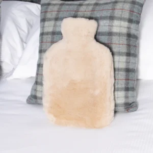 Luxurious Beige Hot Water Bottle Sheepskin from Simply Sheepskin add comfort and style to any room.