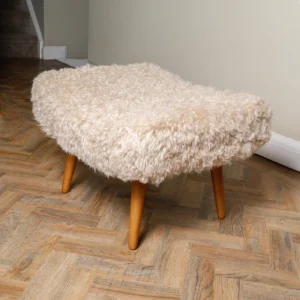 Luxurious Beige Sheepskin Footstool from Simply Sheepskin add comfort and style to any room.