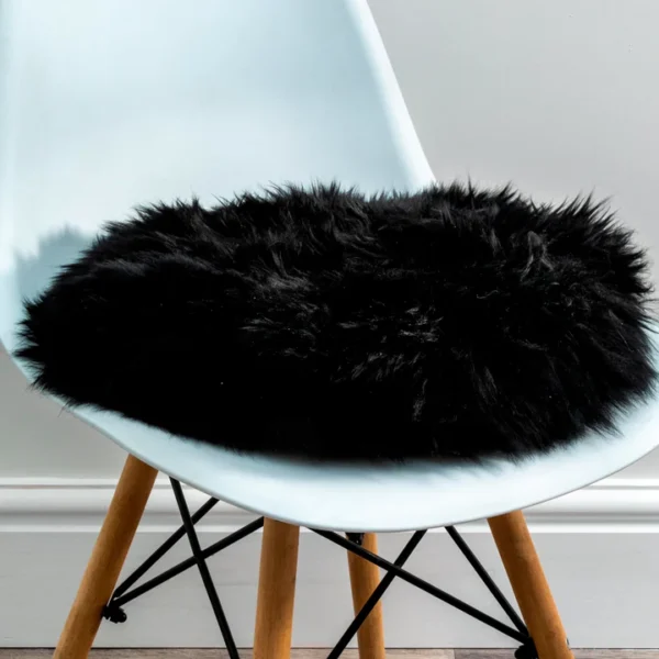 Luxurious Black Round Sheepskin Seat Pad from Simply Sheepskin add comfort and style to any room