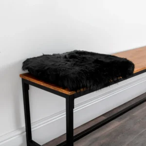 Luxurious Black Square Sheepskin Seat Pad from Simply Sheepskin add comfort and style to any room.