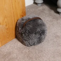 Luxurious Grey Sheepskin Door Stop from Simply Sheepskin add comfort and style to any room.