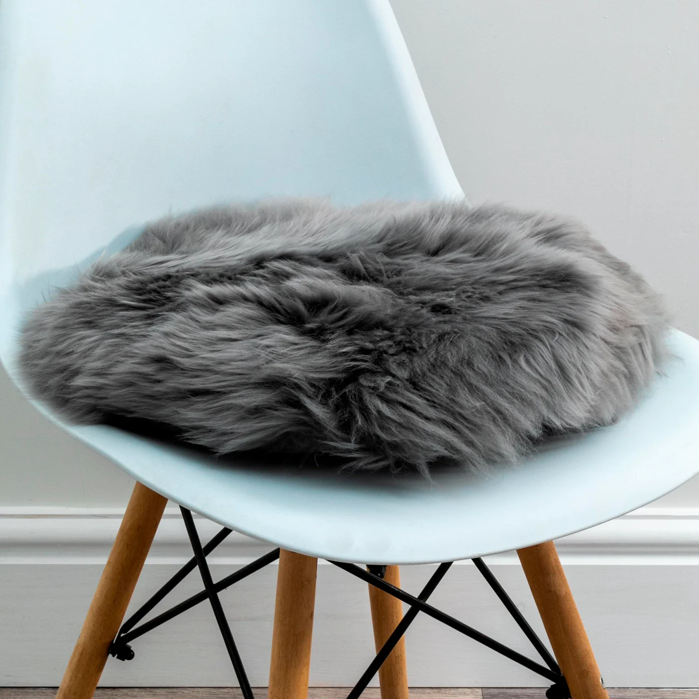 Luxurious Grey Sheepskin Seat Pads from Simply Sheepskin add comfort and style to any room