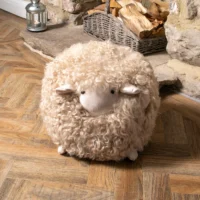 Luxurious Natural White Lamby Childrens Sheepskin Stool from Simply Sheepskin add comfort and style to any room.