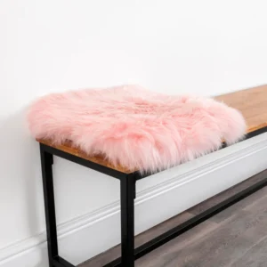 Luxurious Pink Square Sheepskin Seat Pad from Simply Sheepskin add comfort and style to any room.