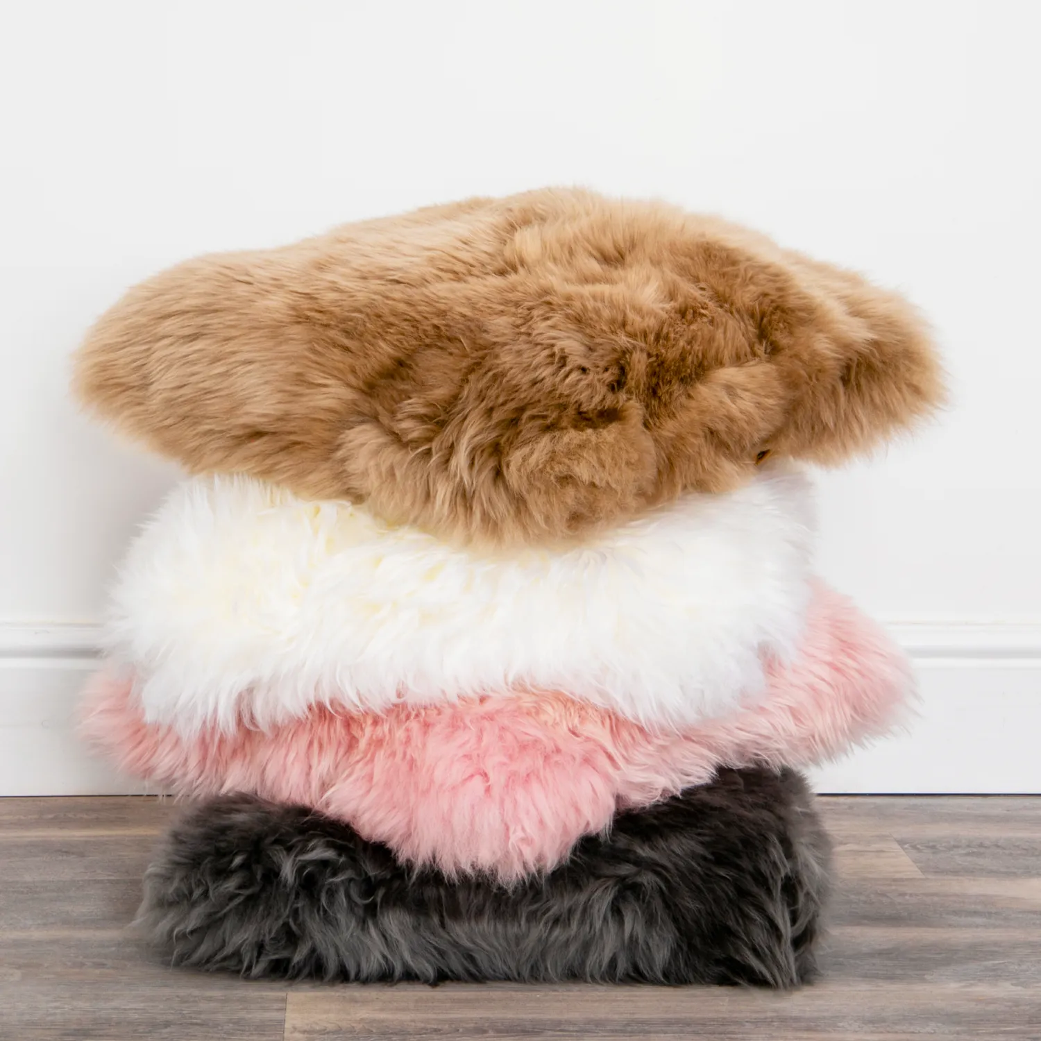 Luxurious Sheepskin Cushions by Shape from Simply Sheepskin add comfort and style to any room.