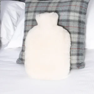 Luxurious White Hot Water Bottle Sheepskin from Simply Sheepskin add comfort and style to any room.