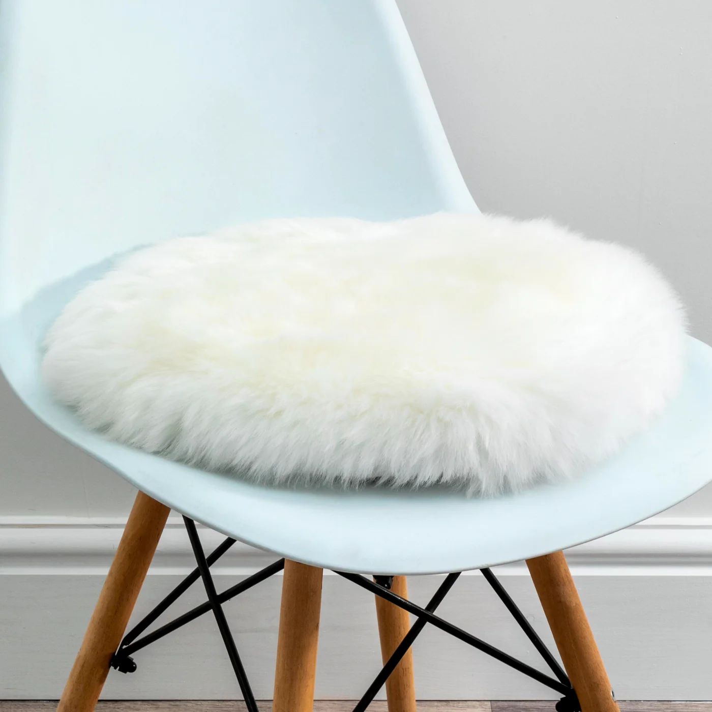 Luxurious White Sheepskin Seat Pads from Simply Sheepskin add comfort and style to any room