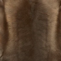 Close-up of the Dark Coloured Reindeer Hide reveals fine, short, slightly wavy hair and a soft texture with subtle brown variations and natural highlights, reflecting its healthy, well-groomed quality.