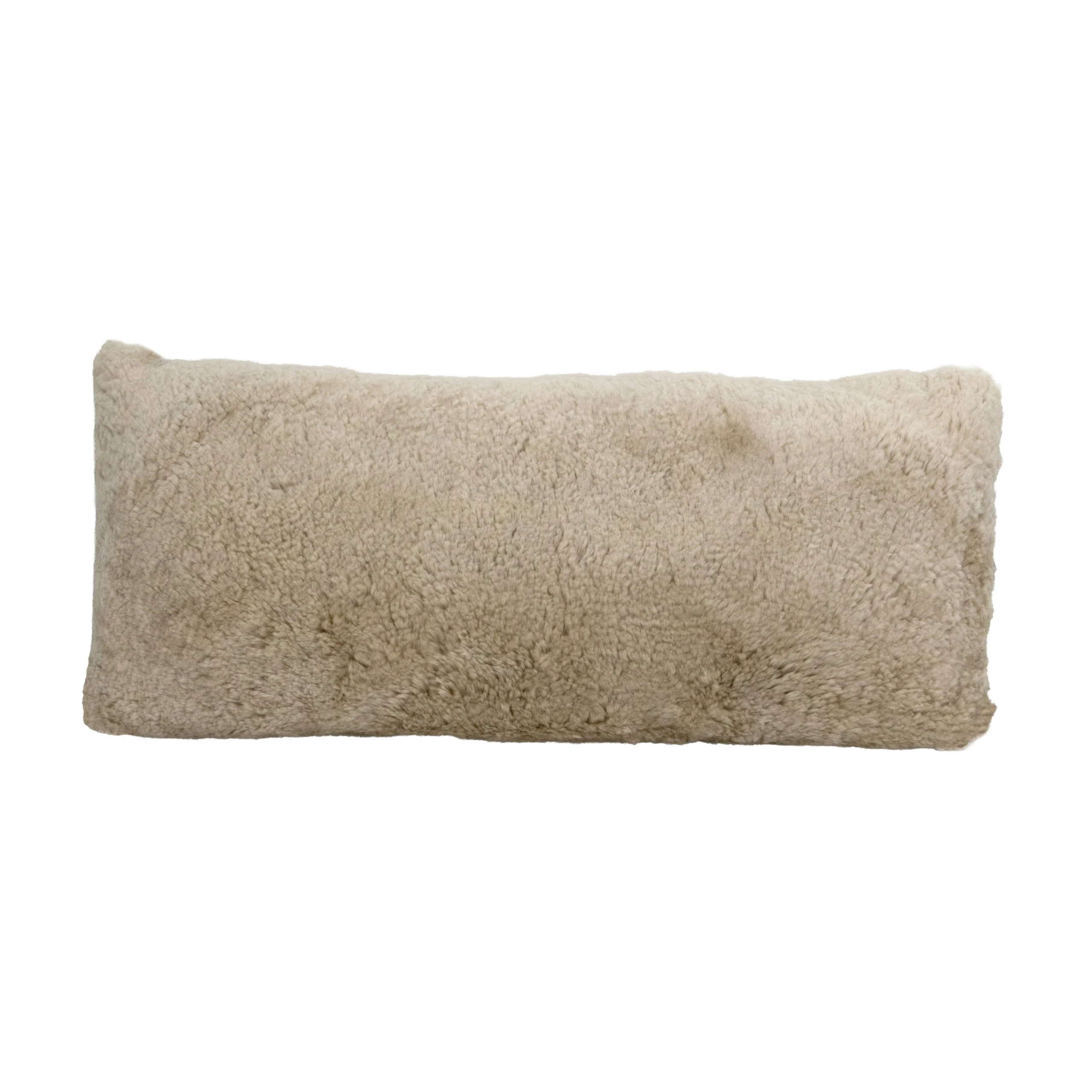 Champagne beige rectangular shearling sheepskin cushion with a short, dense, velvety pile.