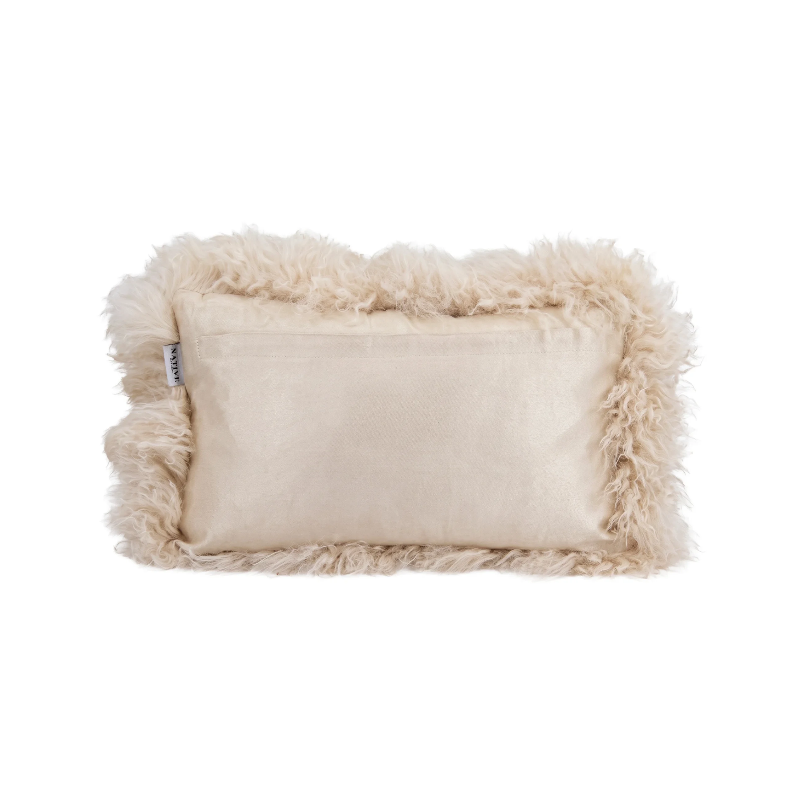 Rectangular cream cushion with a smooth velvet back and long curly sheepskin trim around the edges.